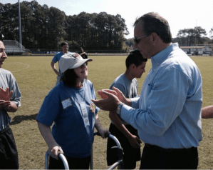 Dr. Rhoads Awarding 2014 Special Olympics Ribbons